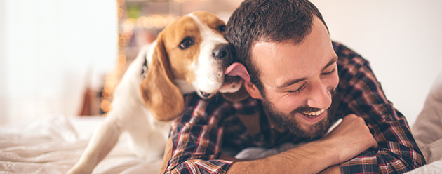 Man with happy dog