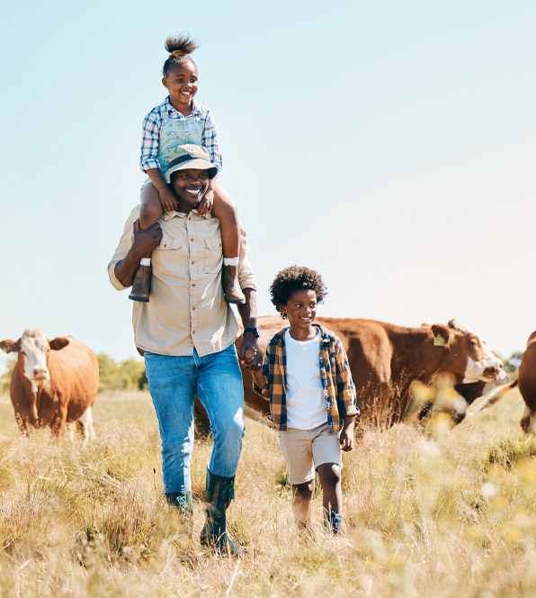 Family in meadow with cattle - Zoetis