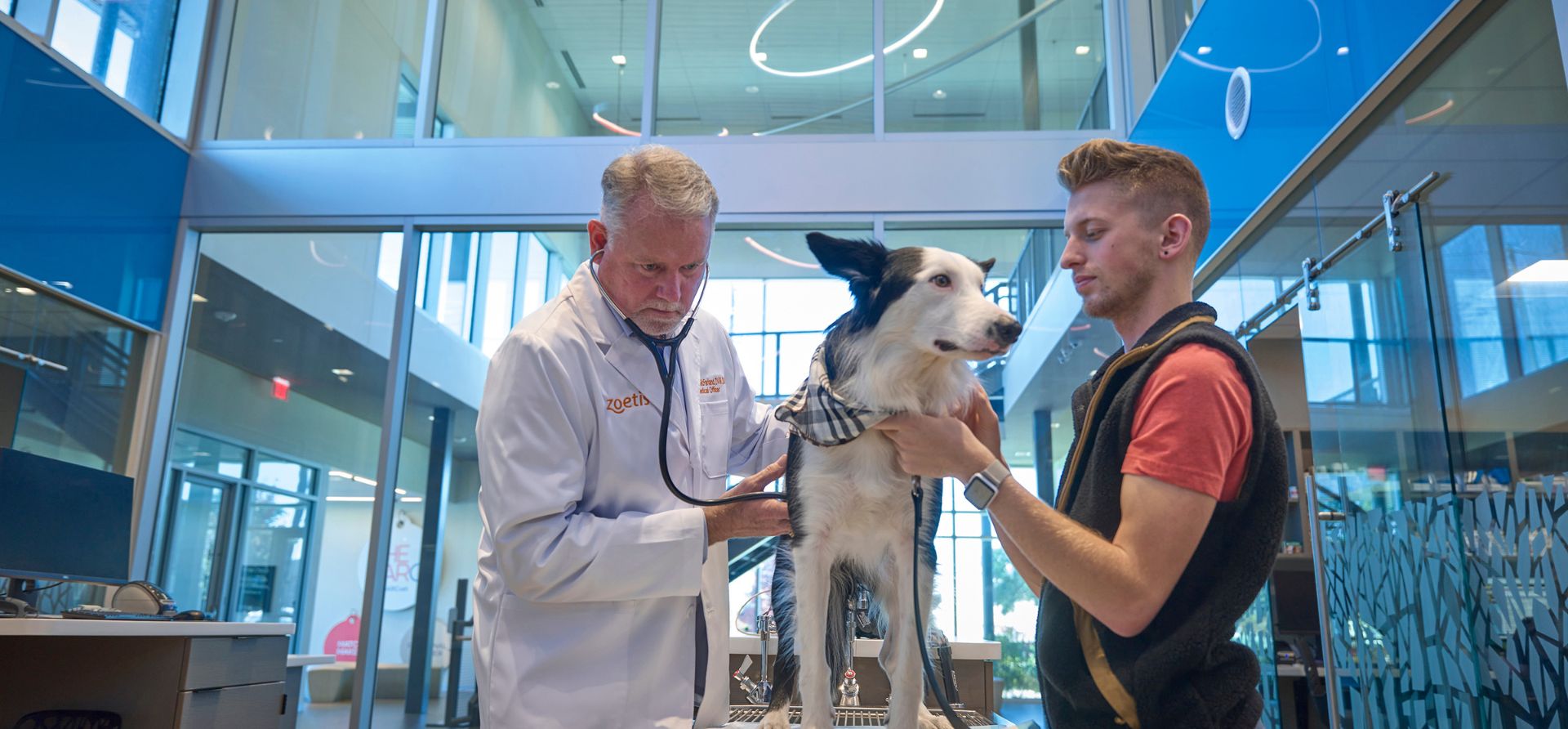 Dr. Mike McFarland with pet and pet owner